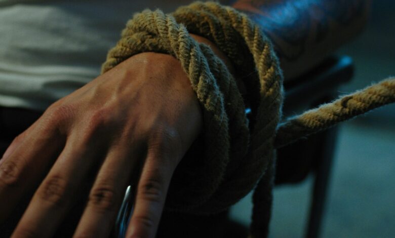 person wearing silver ring and silver ring